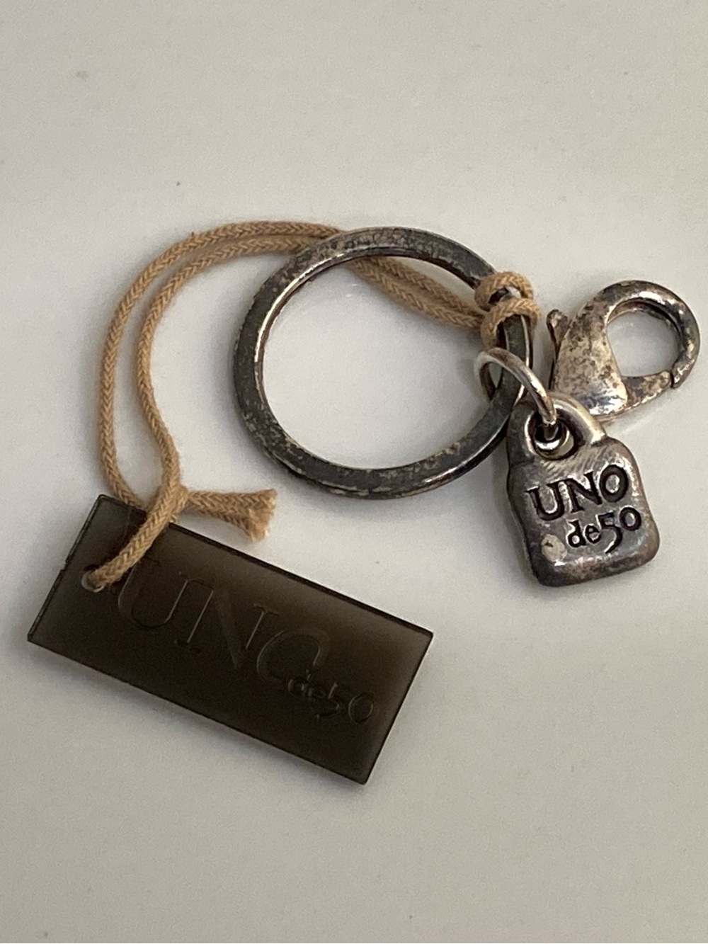 UNO de 50 Silver-Tone Keyring with Padlock Branded Charm NWT *Rare*